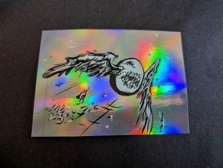 Image of Mad flying Egg inked holofoil trading card