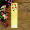 Marque-page lecture dans champ de fleurs