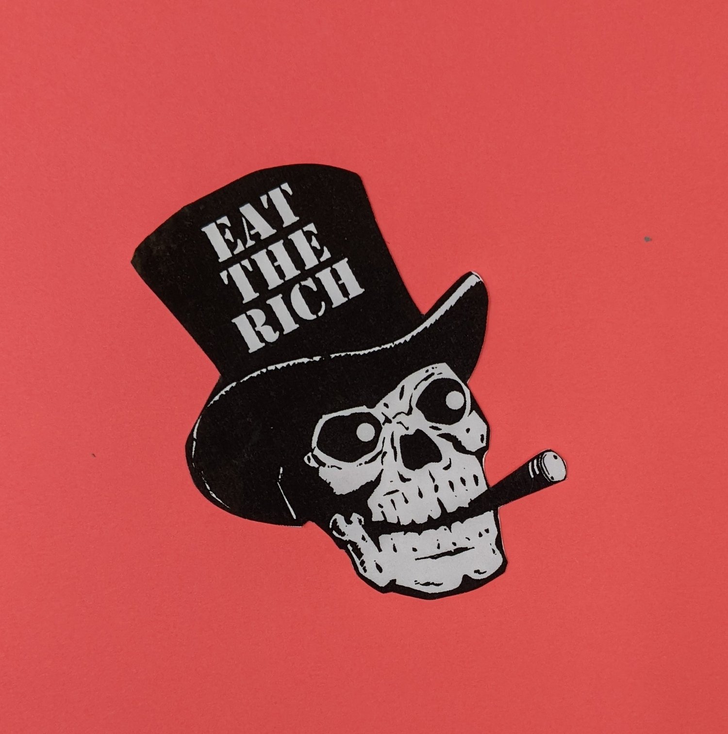 eat the rich: smoking skull (sticker)