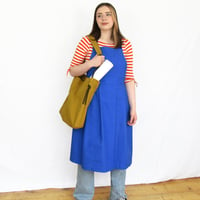 Image 4 of Split Leg Pleated Pinafore Apron with Adjustable Cross Back Straps. Cobalt. No25