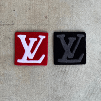 L V logo