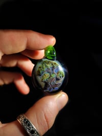 Image 1 of Bonsai pendant backed in galaxy with green energy bale.