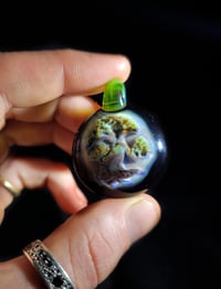 Image 3 of Bonsai pendant backed in galaxy with green energy bale.