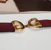 Image of Vtg. Gucci Burgundy "GG" Bracelet 