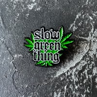 SLOW GREEN THING ENAMEL PIN