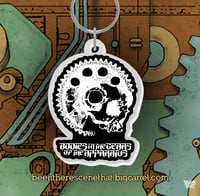 BODIES IN THE GEARS OF THE APPARATUS - GEARSKULL KEYCHAIN