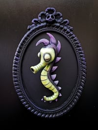 Image 1 of Seahorse green- purple 