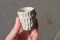 Image 3 of Little carved mugs.