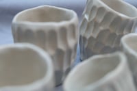 Image 4 of Little carved mugs.