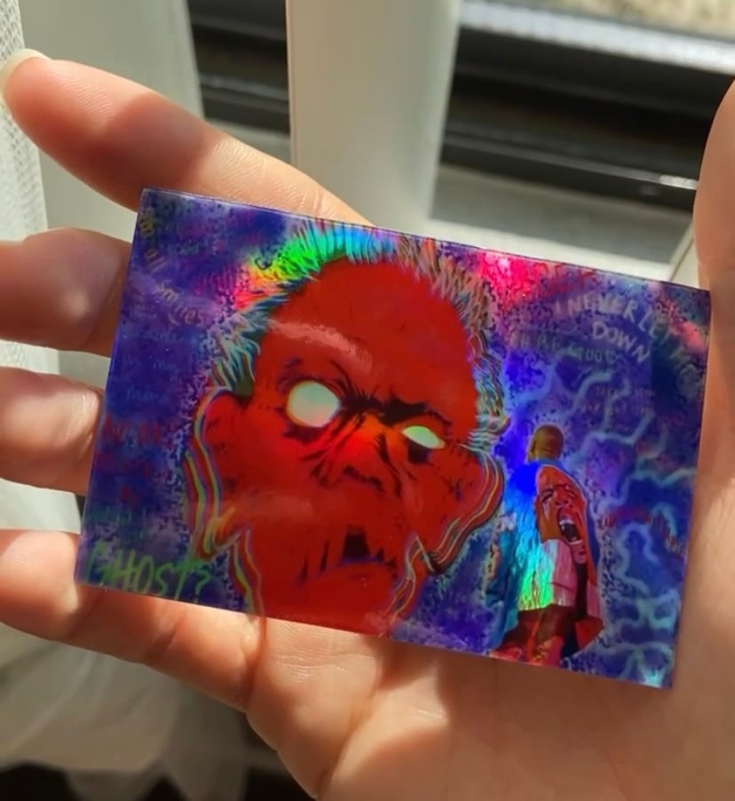 Image of  "Fighting Demons"  Holographic Sticker