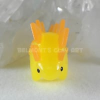 Image 4 of "Translucent" mini Stegosaurus