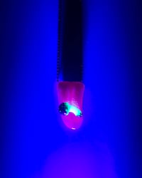 Image 3 of Glow n the dark mushi tongue pendant 