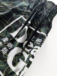 Image 3 of 'Swamp Camo' shorts.