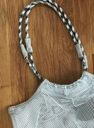 Image of mesh shopper with braided leather strap