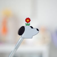 Image 1 of Doggo & flower sticker
