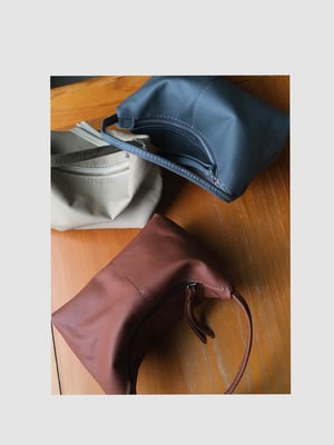 Image of *classic leather* clutches with short strap