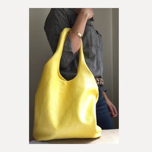 Image of lemon yellow leather shimmer hobo