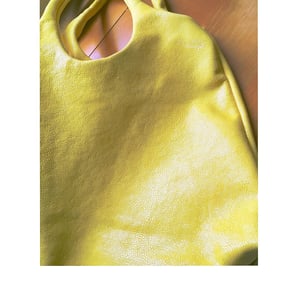 Image of lemon yellow leather shimmer hobo