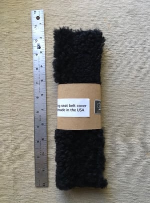 Image of hand made shearling seatbelt covers