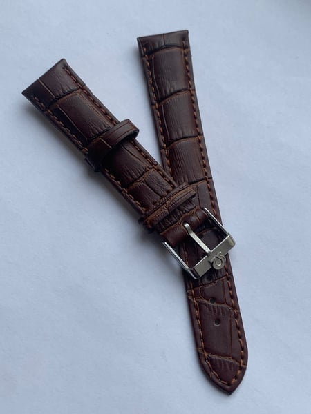 Image of genuine omega brown leather strap,vintage used clean stainless steel buckle attached 20mm.
