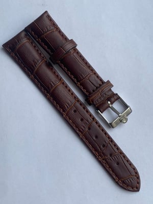 Image of genuine omega brown leather strap,vintage used clean stainless steel buckle attached 20mm.