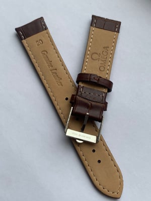 Image of genuine omega brown leather strap,vintage used clean stainless steel buckle attached 20mm.