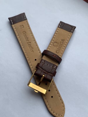 Image of genuine omega brown leather strap,vintage used clean yellow gold plated buckle attached 20mm.