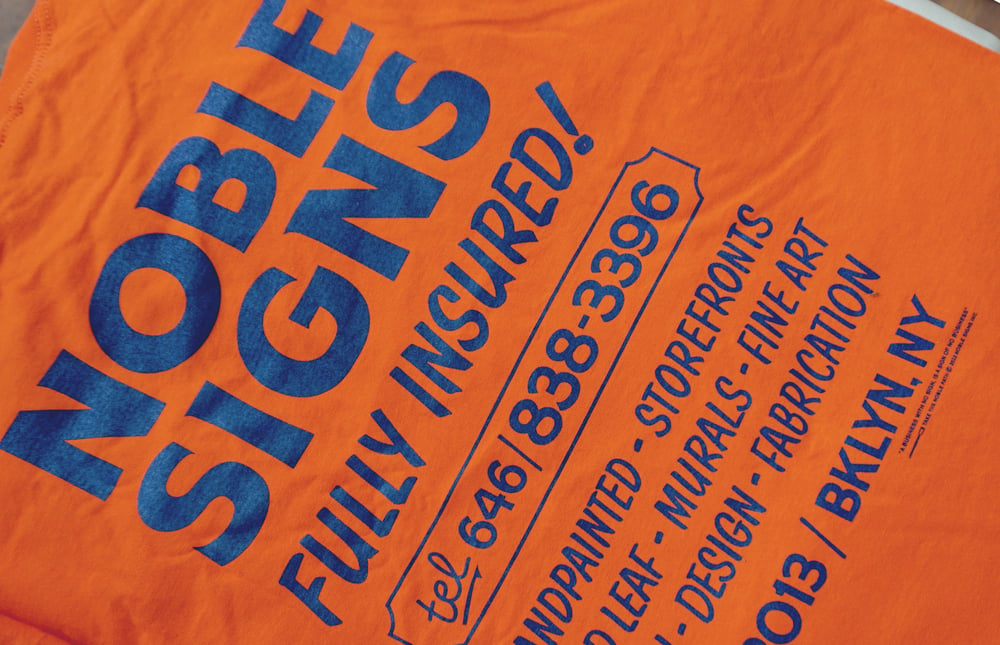 Noble Signs Official “Shop” Long Sleeve (Orange)
