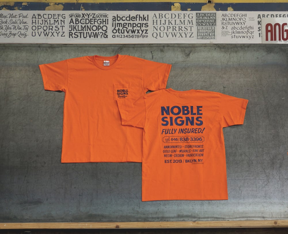 Noble Signs Official “Shop” T-Shirt (Orange)