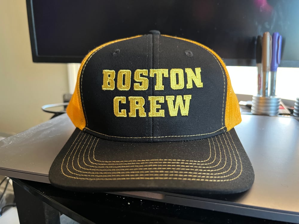 Black and Gold Trucker Snapback Cap with Boston Crew logo