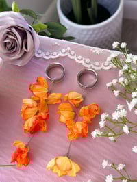 Image 5 of Oversized Orange Flower Dangles (Silver)