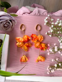 Image 2 of Oversized Orange Flower Dangles (Gold)