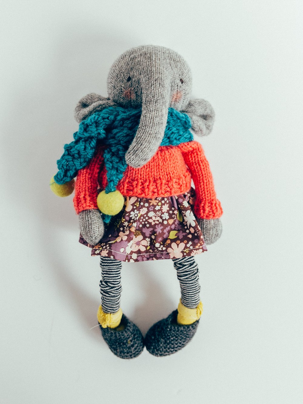 Image of Ailis - Wool Filled Sculpted Sock Elephant with removable sweater, scarf, dress, socks and shoes