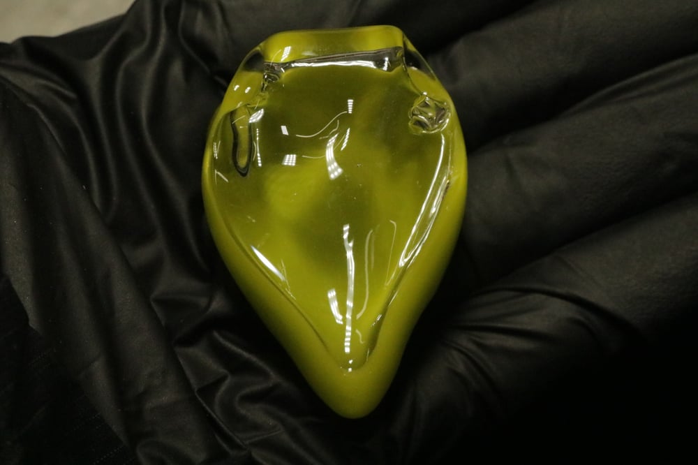 Alien face pendant 