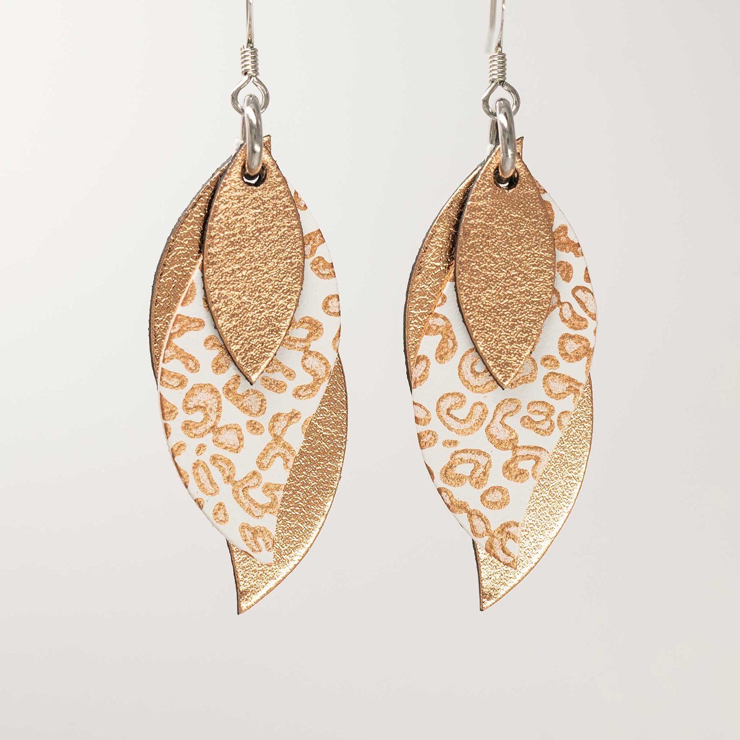 Image of Handmade Australian leather leaf earrings - Copper, bronze leopard on white, copper [LLW-508]