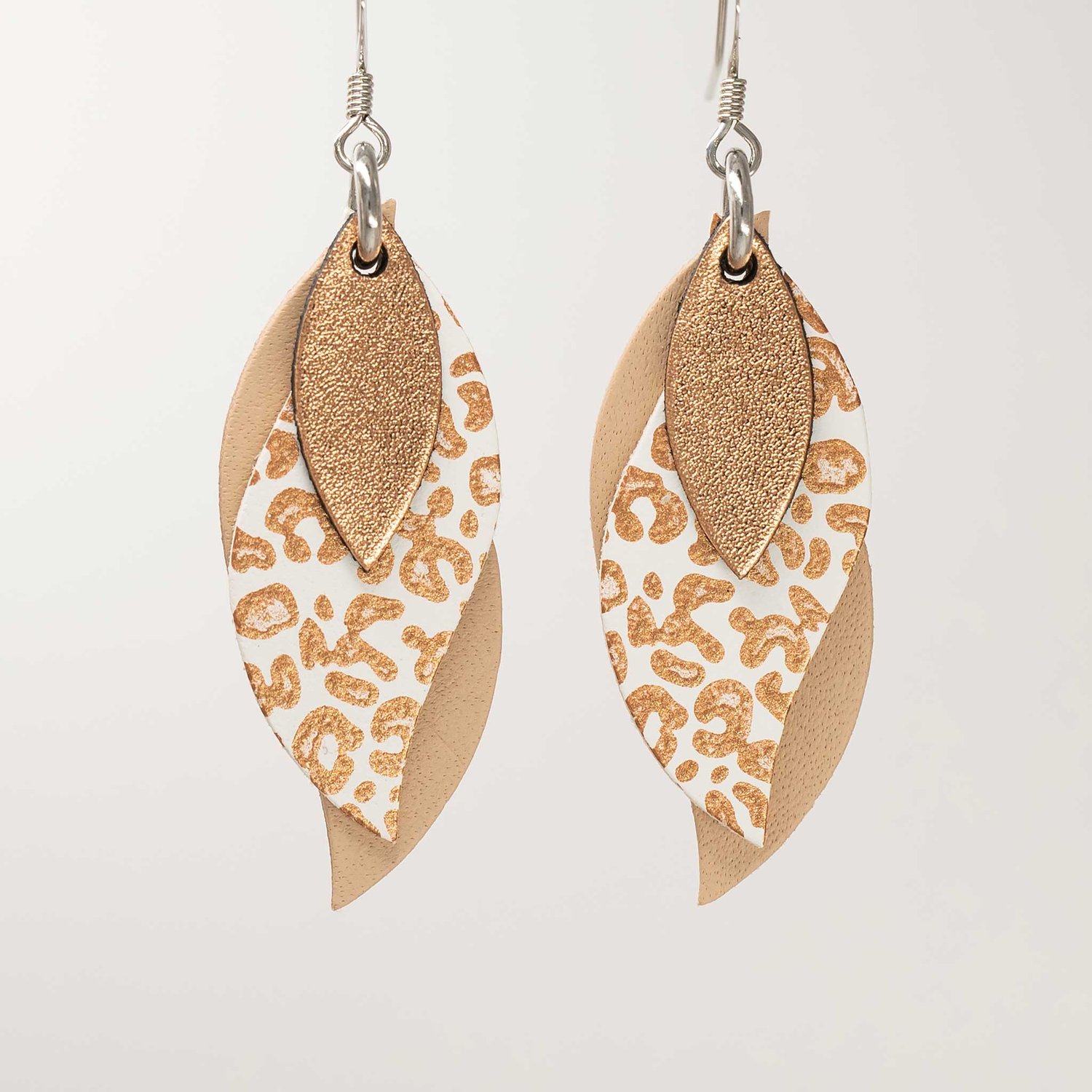 Image of Handmade Australian leather leaf earrings - Copper, bronze leopard on white, natural [LLW-501]