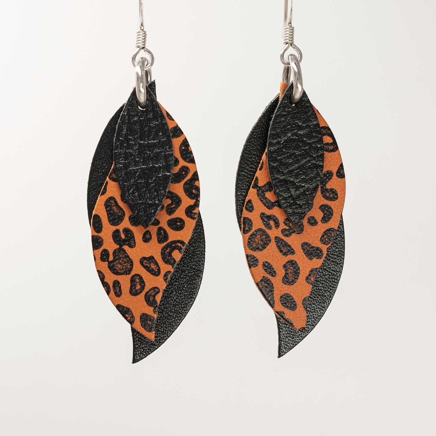 Image of Handmade Australian leather leaf earrings - Black with black leopard on saddle tan [LLT-509]