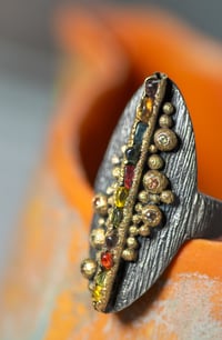 Image 1 of 'into light' - recycled silver and gold ring with raw and faceted sapphires