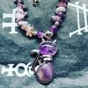 cat pendant on necklace
