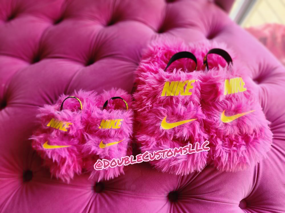Image of Hot Pink and Yellow Nike Slides