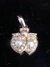 Victorian high carat 15ct yellow gold seed pearl double heart pendant