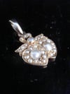 Victorian high carat 15ct yellow gold seed pearl double heart pendant