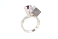 Image 5 of Rhodolite garnet in silver claw setting, interlaced with cube