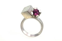 Image 1 of Rhodolite garnet in silver claw setting, interlaced with cube