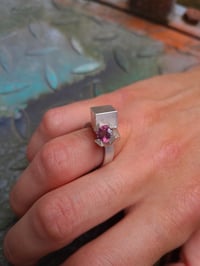 Image 2 of Rhodolite garnet in silver claw setting, interlaced with cube