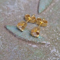 Image 3 of Contemporary 4-claw asscher cut diamond studs in 18ct gold