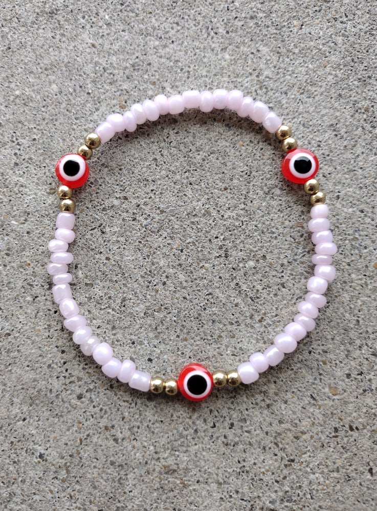 Image of Light pink + red evil eye anklet 