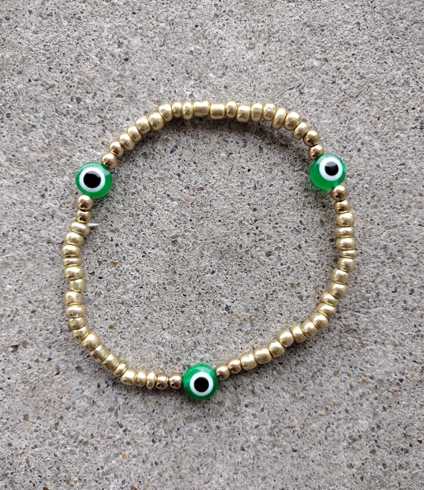 Image of Gold + green evil eye anklet 