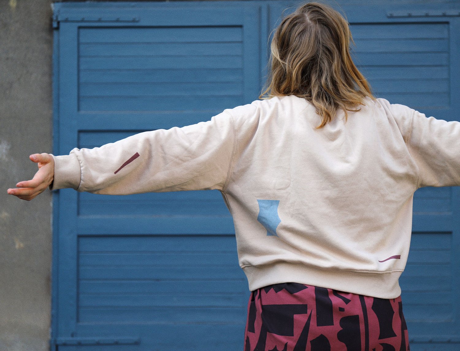 Image of CUT OUTS BEIGE SWEATSHIRT