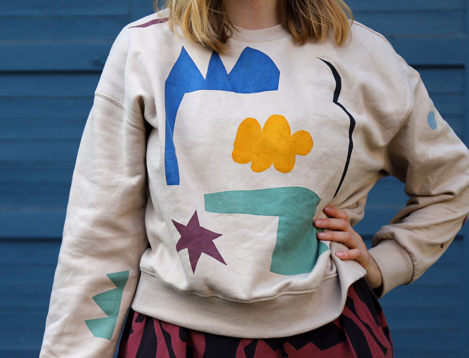 Image of CUT OUTS BEIGE SWEATSHIRT